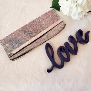 XHILARATION SILVER CLUTCH